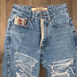 Distressed designer brand mom jeans.